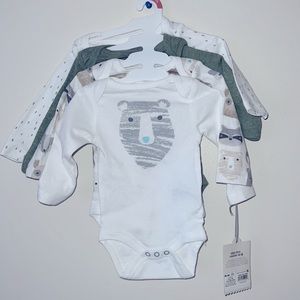 4 pack of NB long sleeve onsie